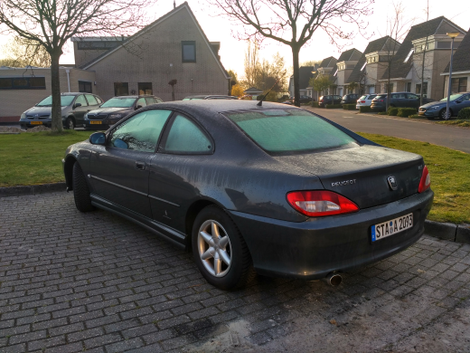 My slighly icy (and 346k km) Peugeot 406 coupe, which I swapped for my 205 CTi convertible later that day, in the Netherlands.